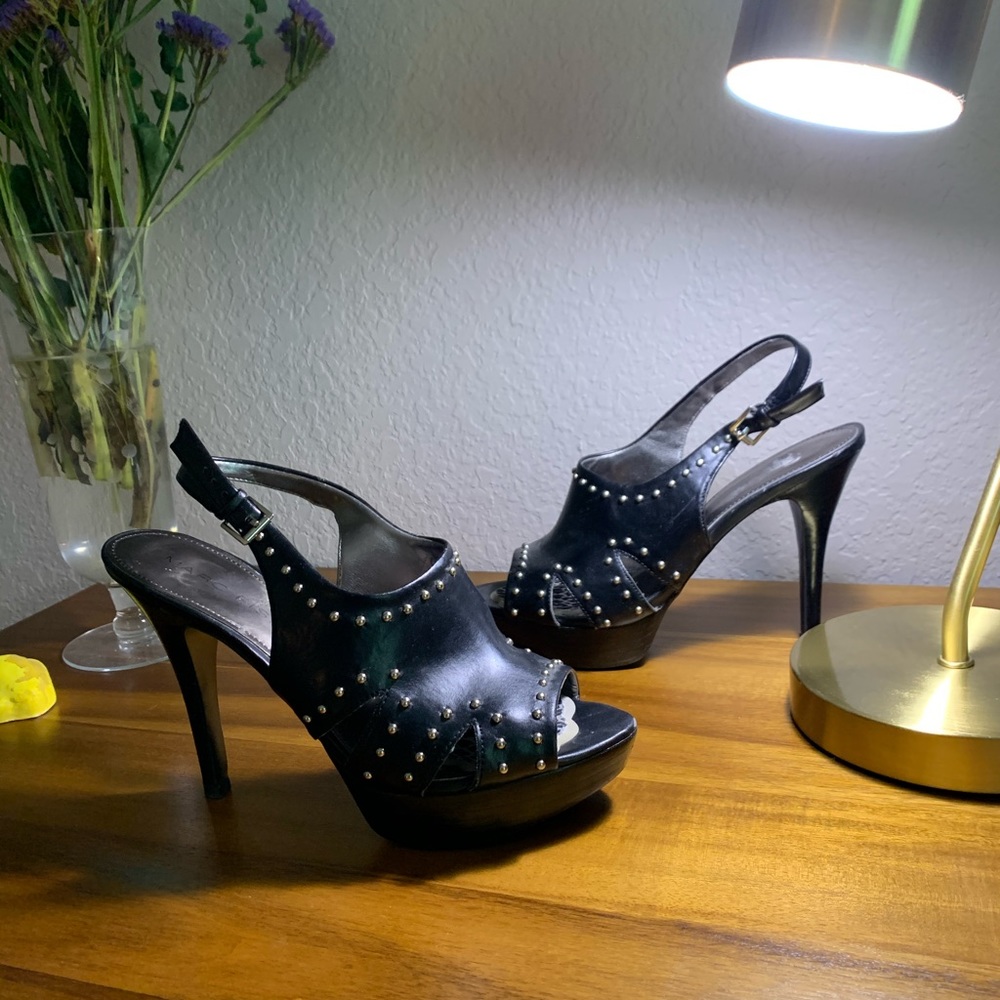 Black studded 2.5 inch heels.